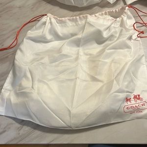 Coach purse comes with the originally bag.